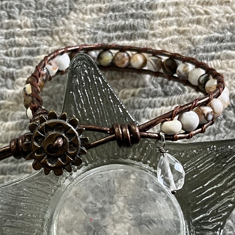 Bronze Leather Wrap Bracelet, fossilized wood beads, quartz crystal charm